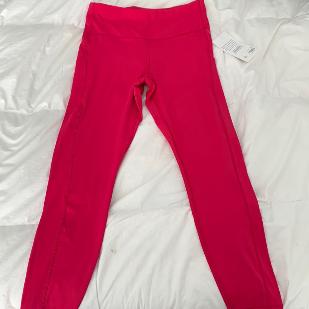 Athleta ultimate stash pocket 7/8 tight